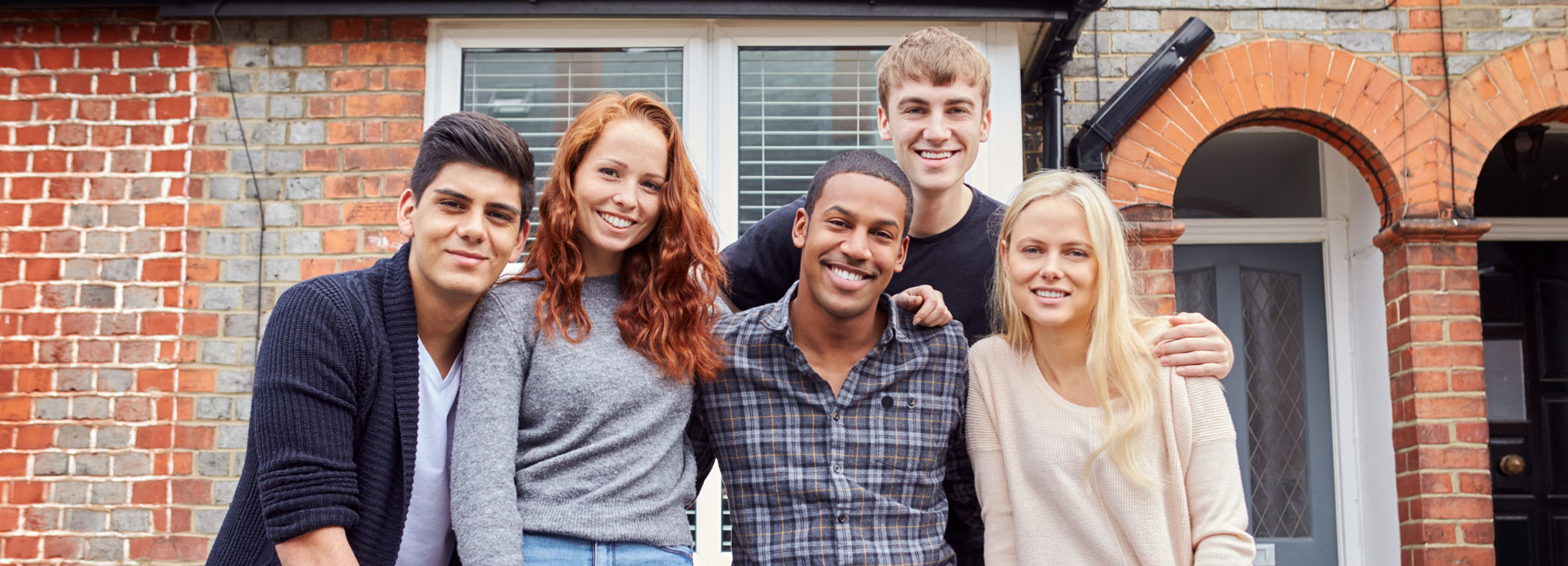 Students stood outside a house